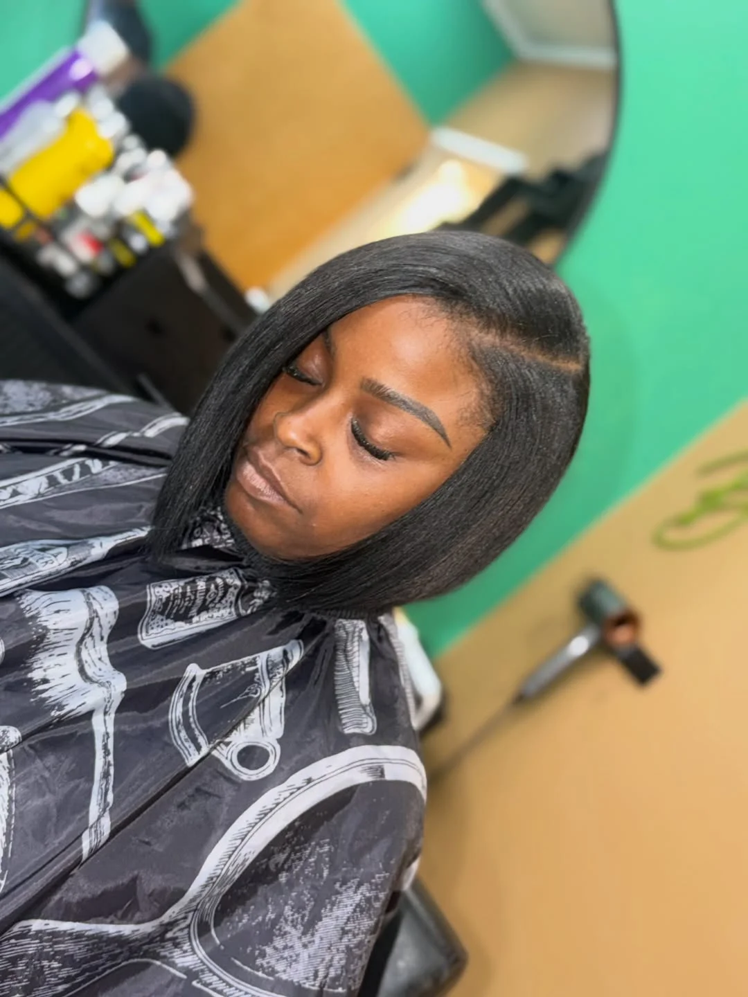 bob hairstyles for black women Sleek Angled Bob With Soft Side Part