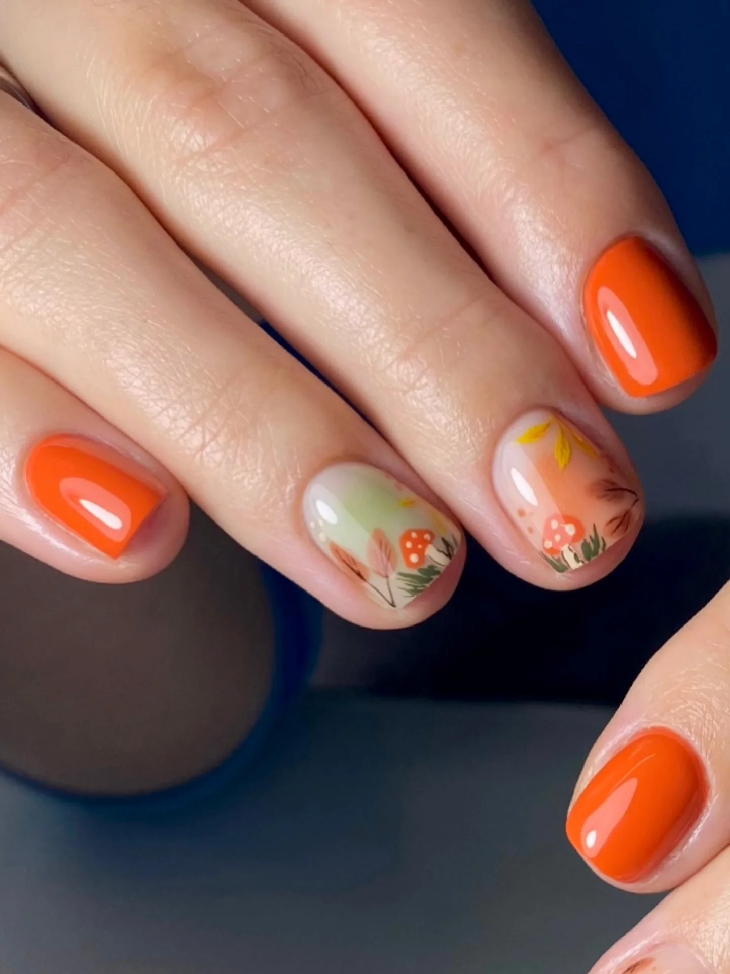 fall manicure 2026 Bright Tangerine Short Nails With Forest Accents
