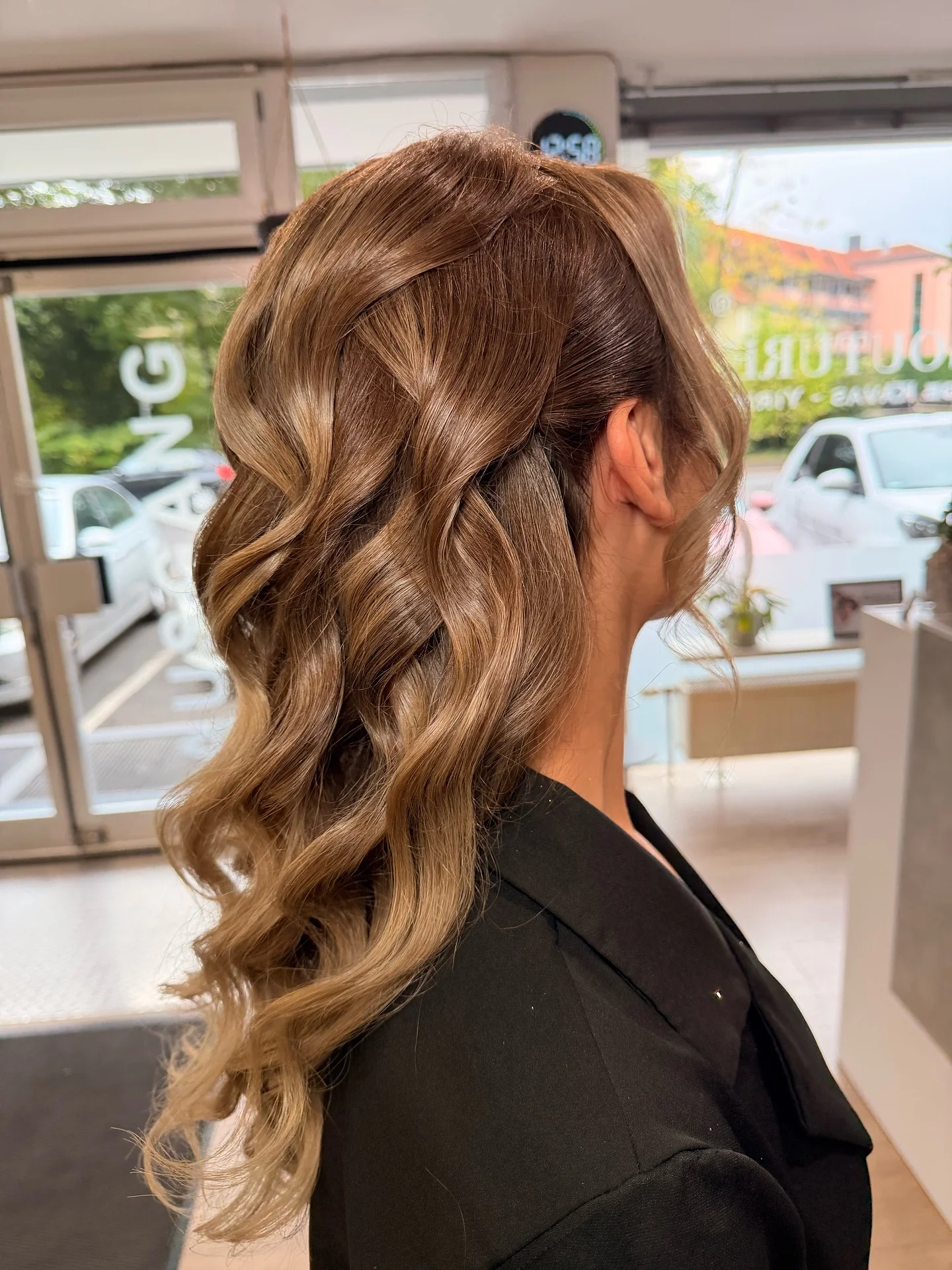 body waves hairstyle Soft Half-Up Waves With Dimensional Blonde Color