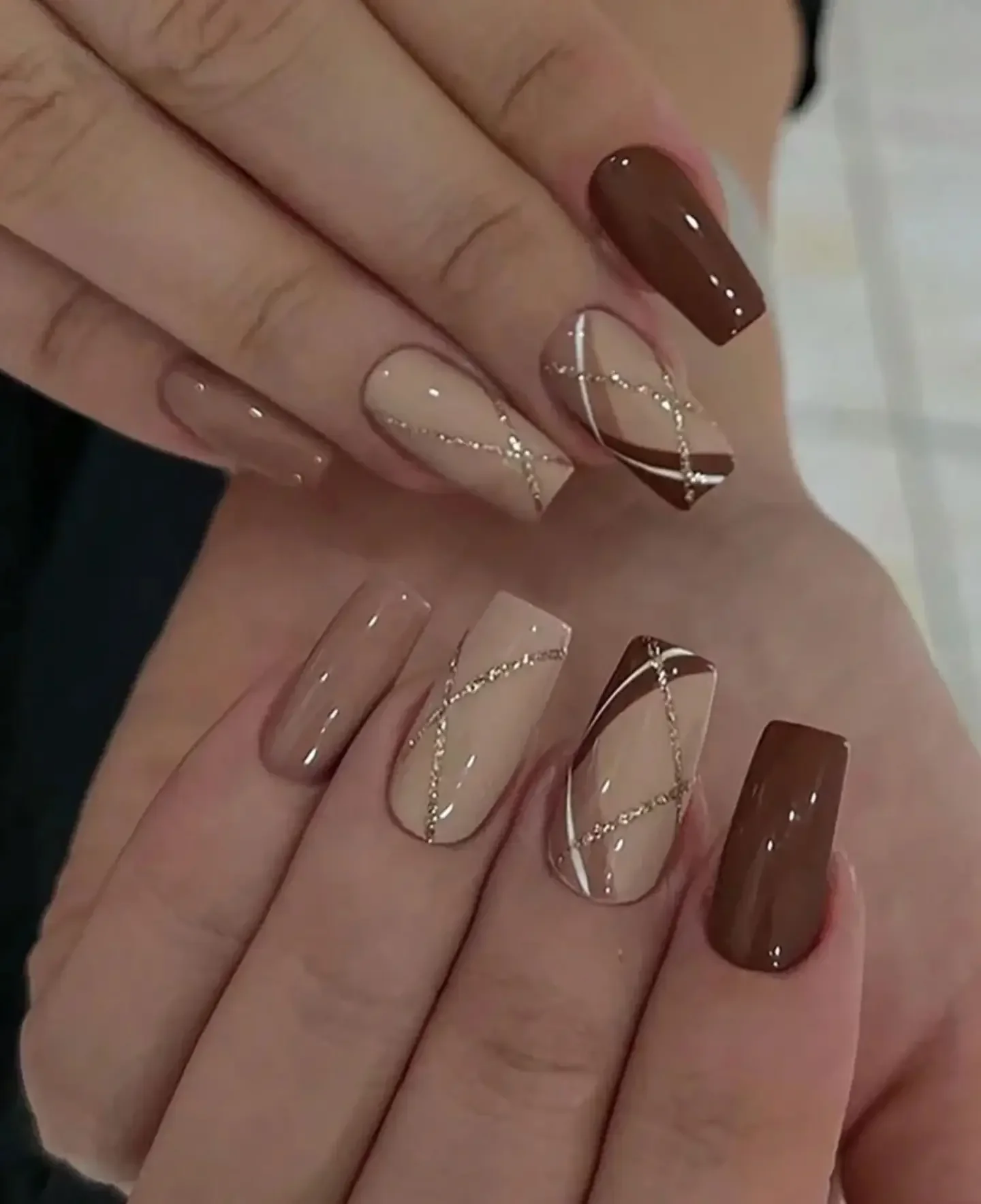 fall acrylic nails 2026 Chocolate Mocha Acrylic Nails With Delicate Gold Lines