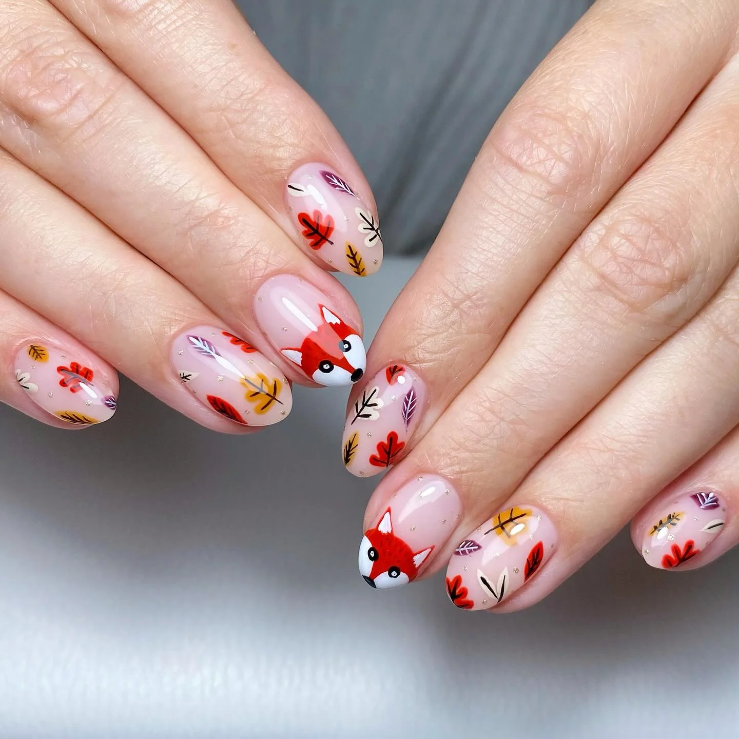 fall nail art 2026 Charming Fox And Falling Leaves Manicure