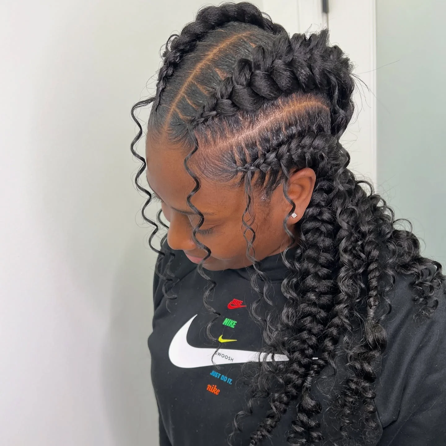 feed in braid hairstyles Curly Feed-In Braids With Dimensional Crown Braiding