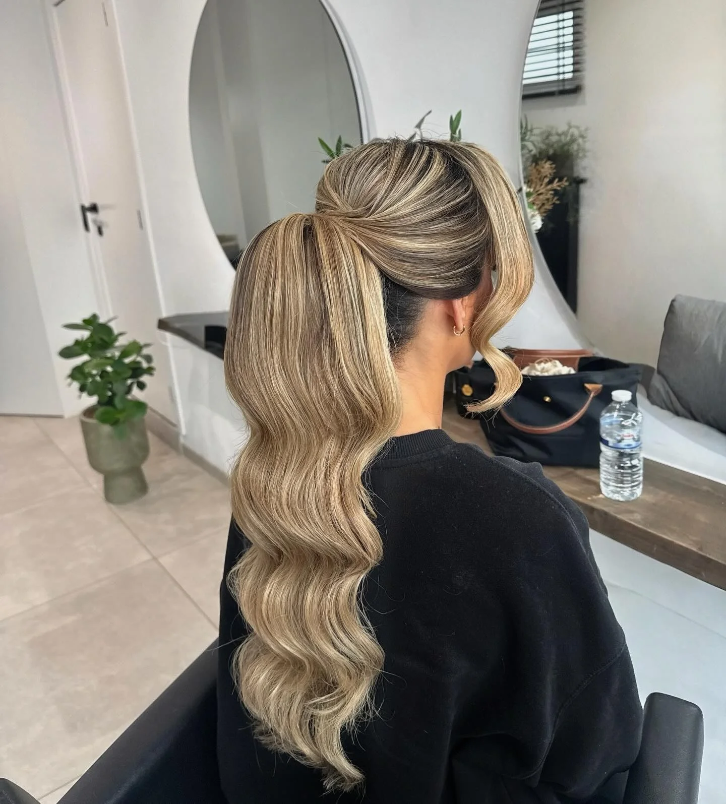 september hairstyles ideas 2026 Elegant Blonde Ponytail With Soft Face-Framing Layers