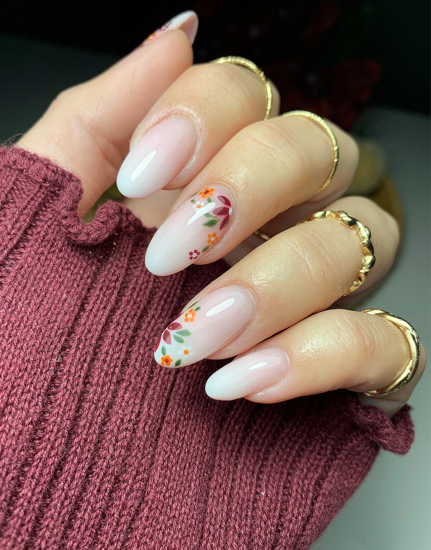 september nail designs 2026 Milky Almond Nails With Tiny Autumn Floral Accents