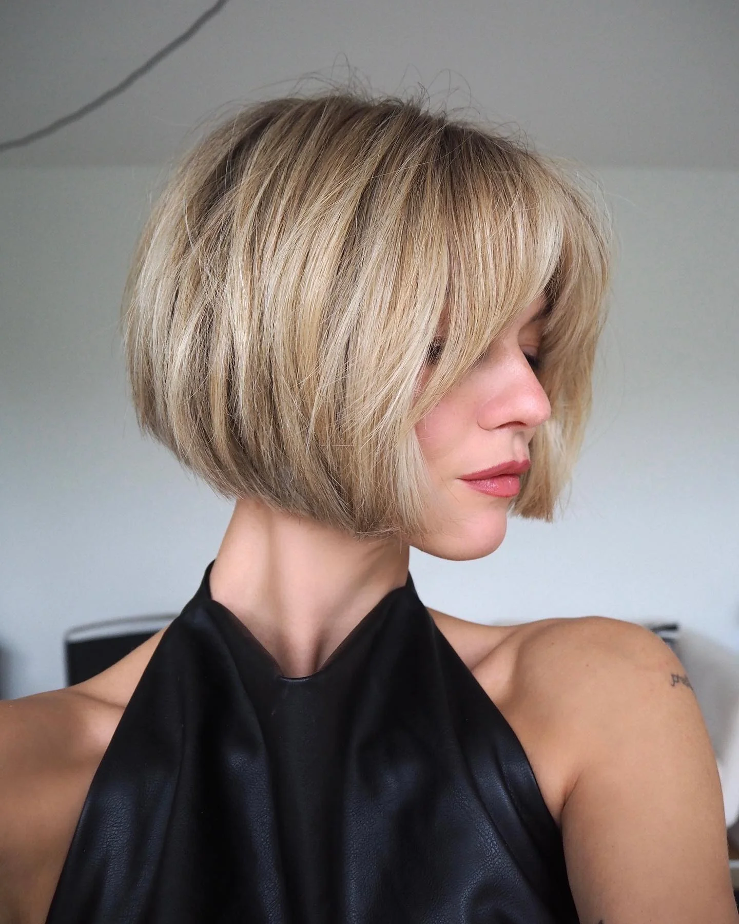 short bobbed hairstyle Textured French-Inspired Bob With Wispy Fringe