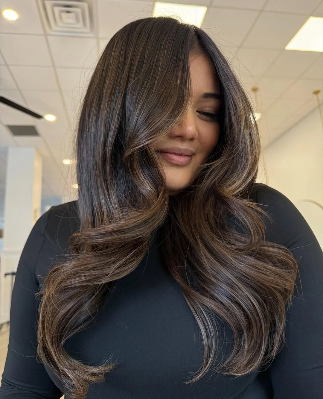dimensional brunette hair color Luxurious Brunette Curls With Expensive Shine