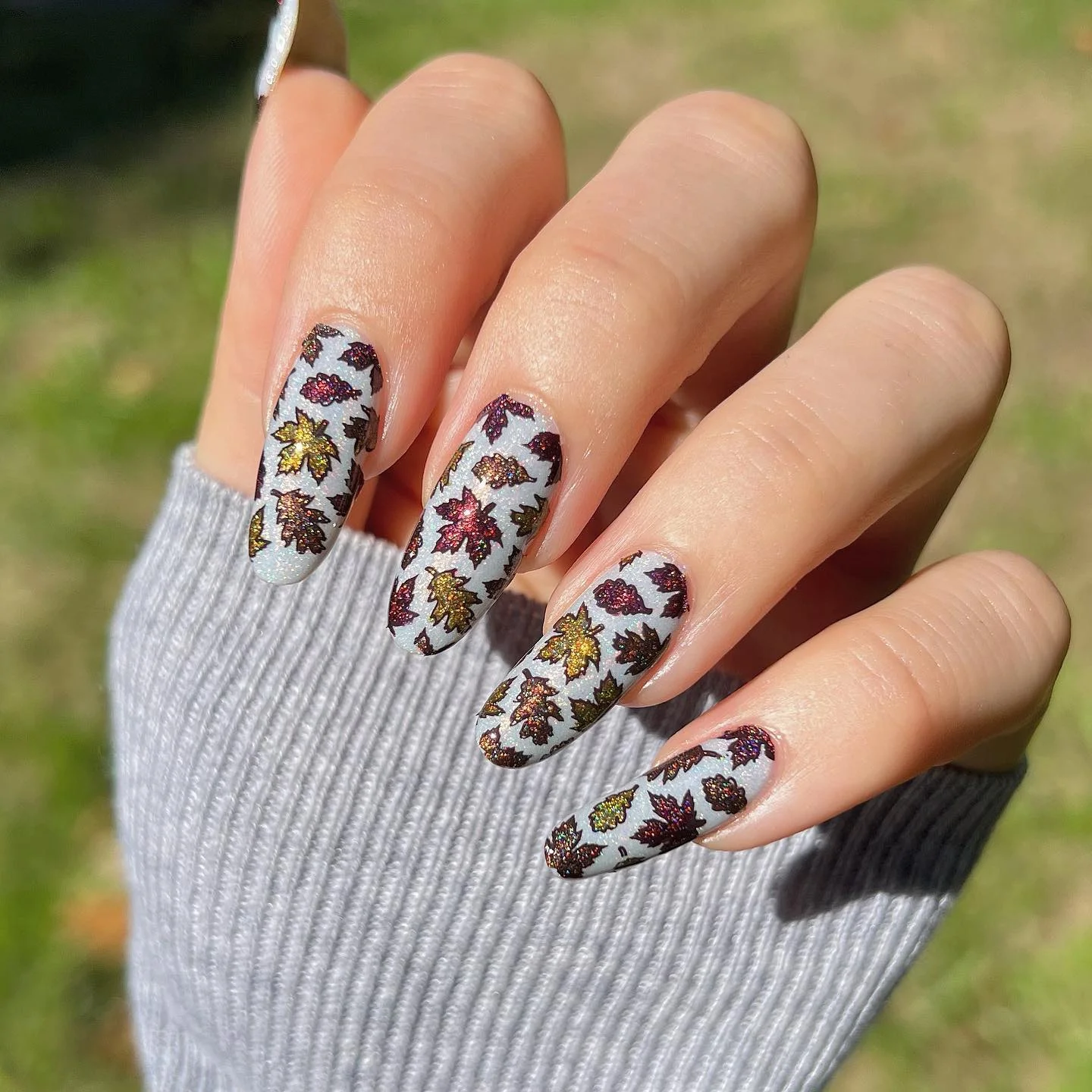 fall nail art 2026 Muted Grey Autumn Leaves With Shimmering Details