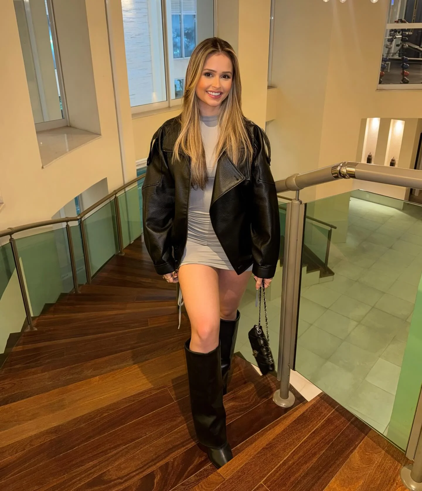 going out outfits fall 2026 Leather Jacket And Mini Dress With Tall Boots For Cool Fall Evenings