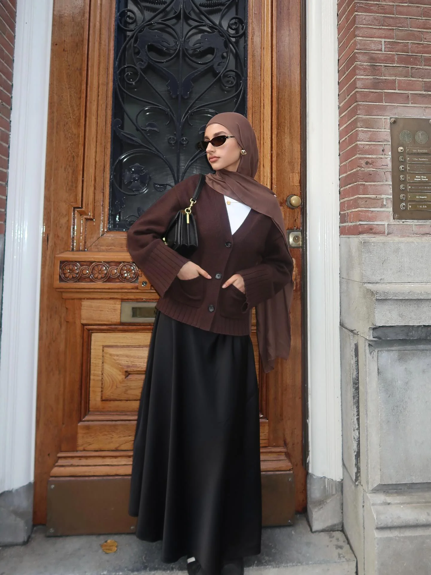 womens modest fall outfits 2026 Chocolate Cardigan And Satin Skirt With Hijab Styling