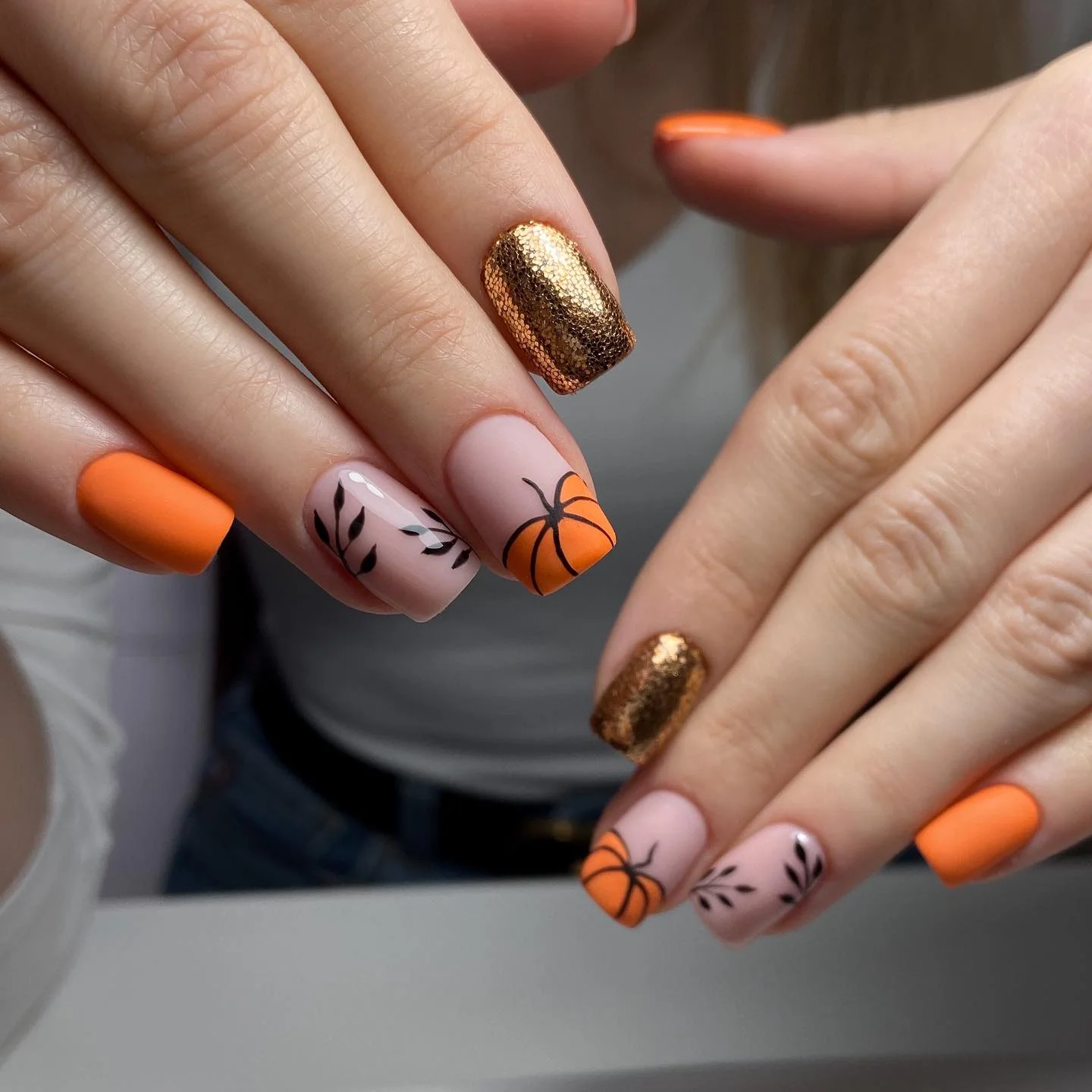fall medium nail ideas 2026 Modern Pumpkin Accent Nails With Copper Sparkle