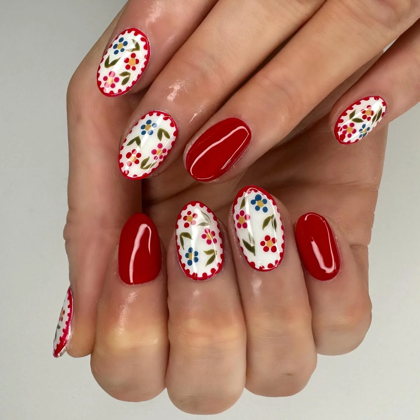 fall nail art 2026 Classic Scandinavian Floral Red Nails