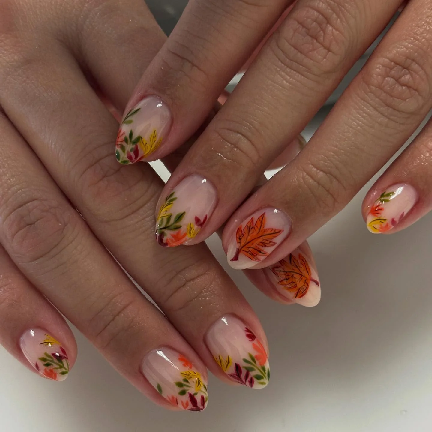september nail art ideas 2026 Soft Botanical Garden Nails With Delicate Autumn Leaves