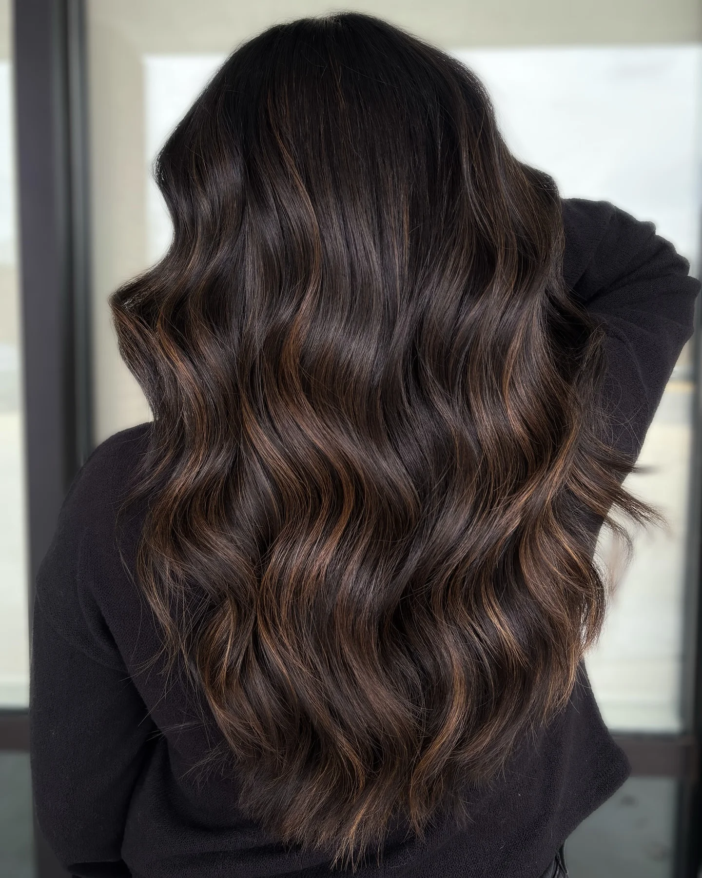 dimensional brunette hair color Dark Brunette With Delicate Cocoa Ribbons