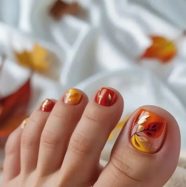 fall pedicure ideas 2026 Warm Autumn Leaves In Rich Seasonal Tones