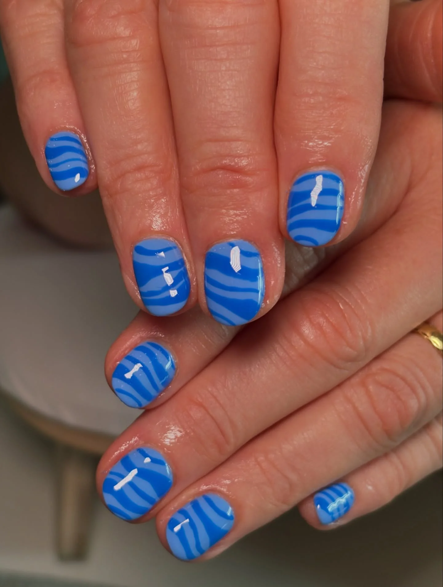 nail designs for august 2026 Ocean Blue Zebra Nails For A Fresh Coastal Finish