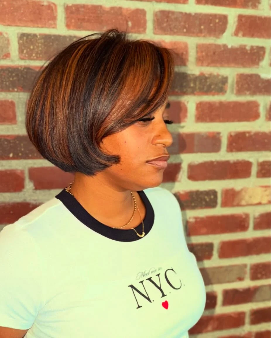 bob hairstyles for black women Soft Layered Copper Bob With Side-Swept Volume