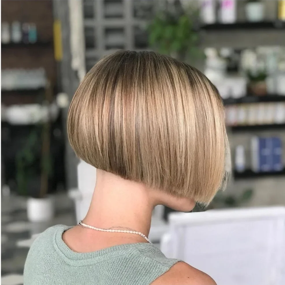 short bobbed hairstyle Precision Blonde Bob With A Sculpted Nape