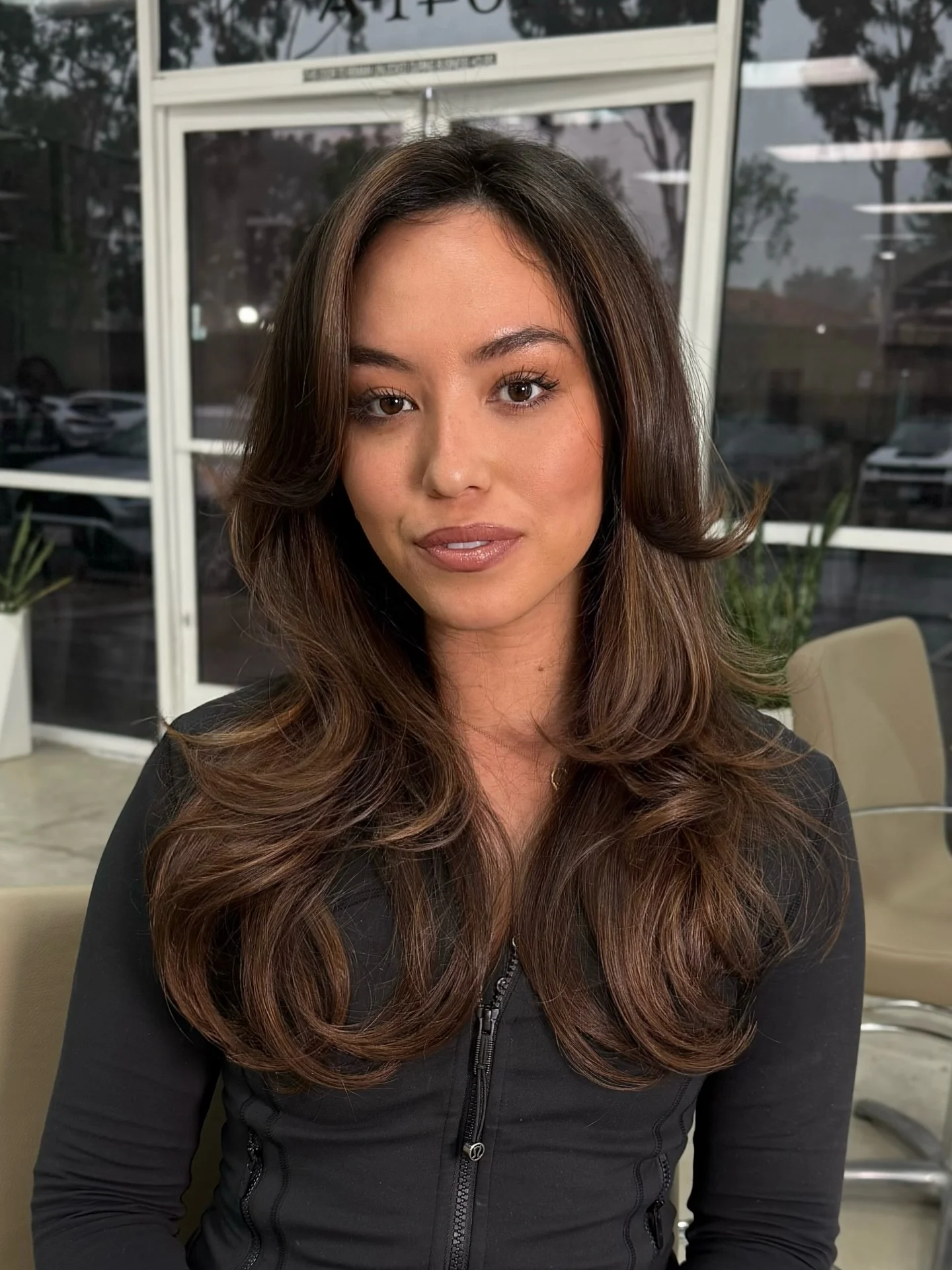 dimensional brunette hair color Curtain Layers With Chocolate Glow