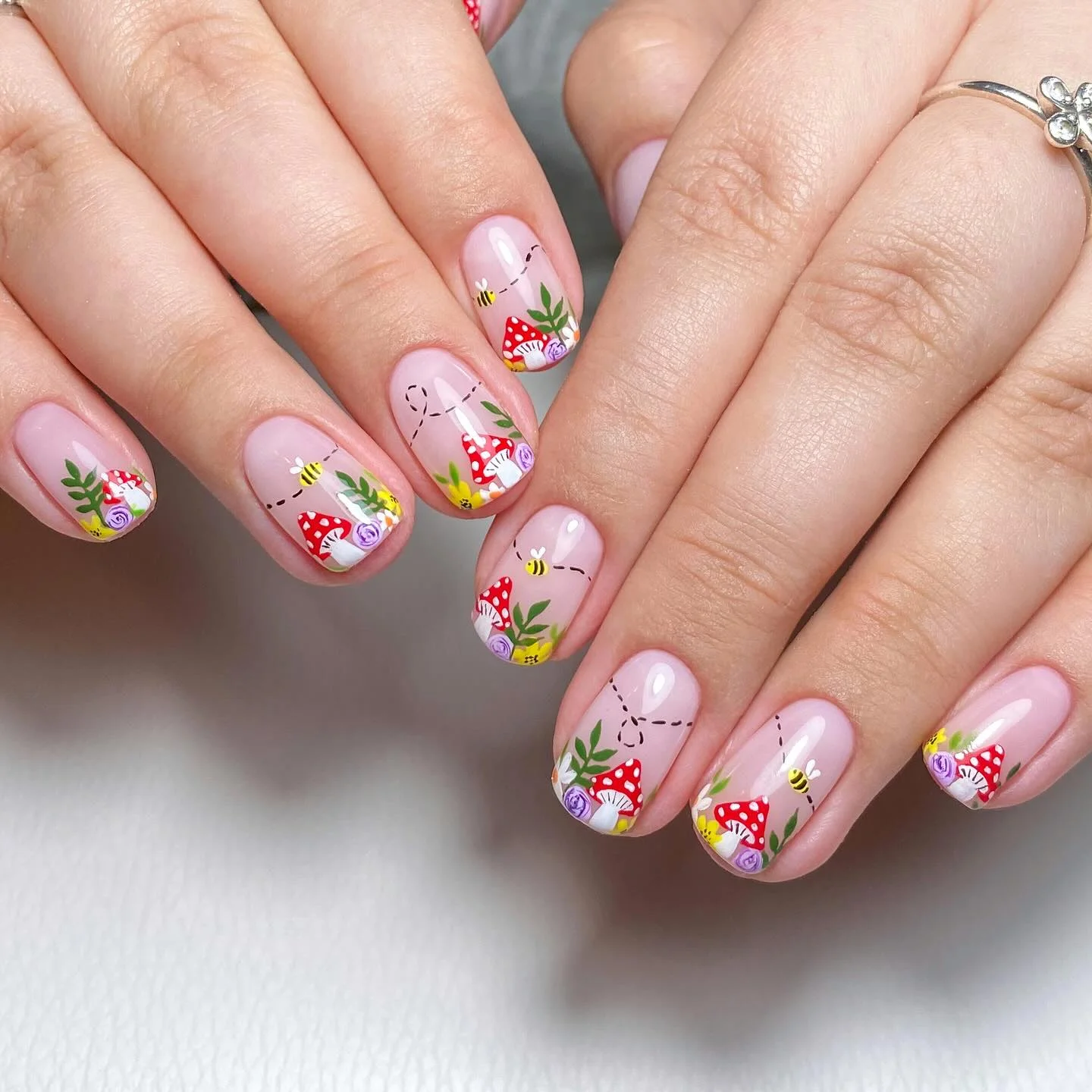 fall nail art 2026 Whimsical Forest Cottage Nails With Bees And Mushrooms