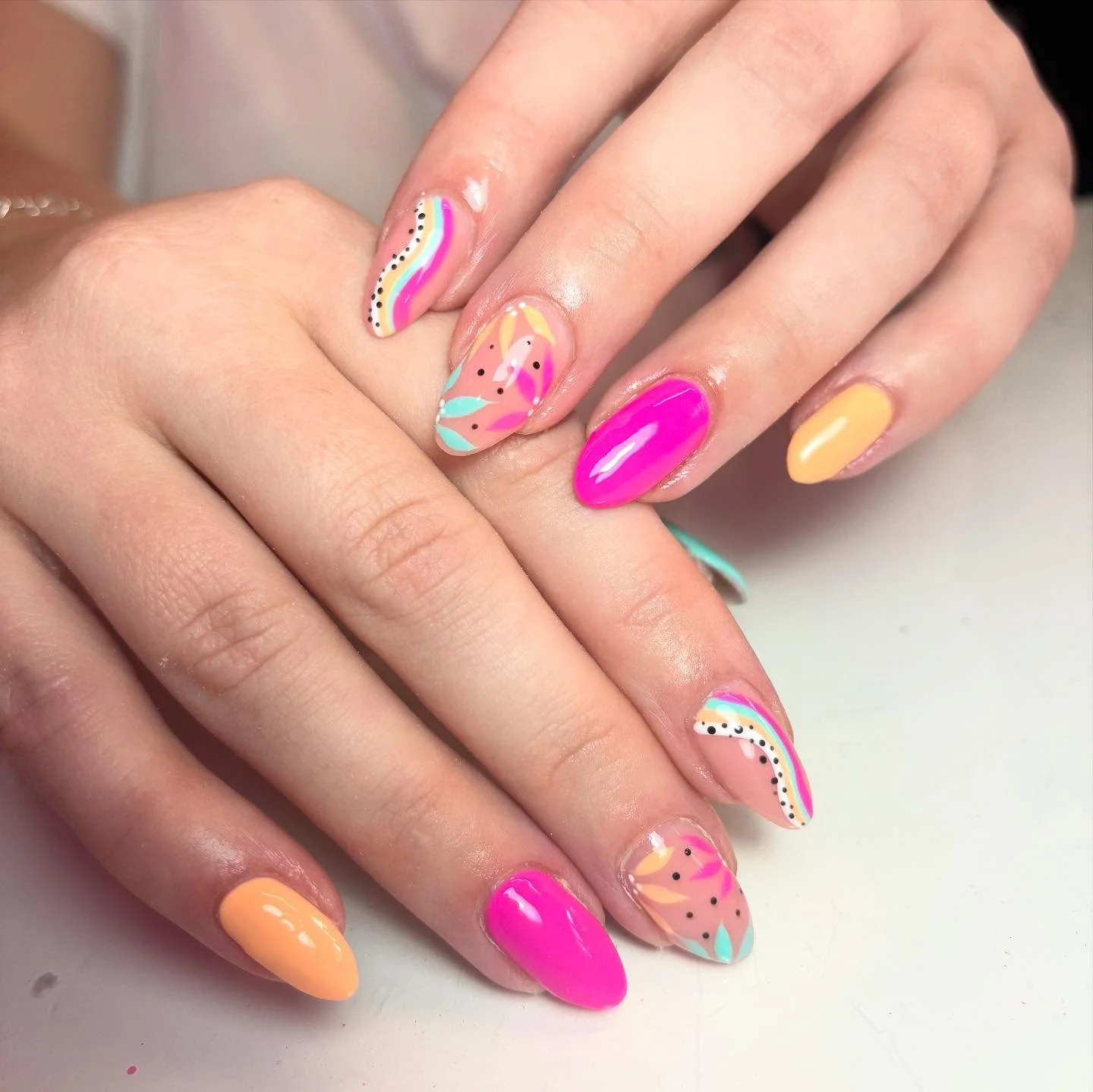 nail designs for august 2026 Abstract Tropical Swirls With Modern Almond Elegance