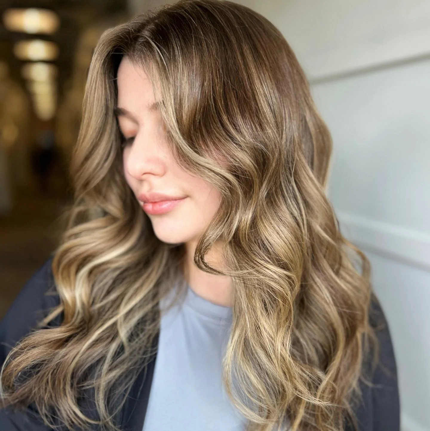 dirty blonde hair color Face-Framing Waves With Effortless Natural Brightness