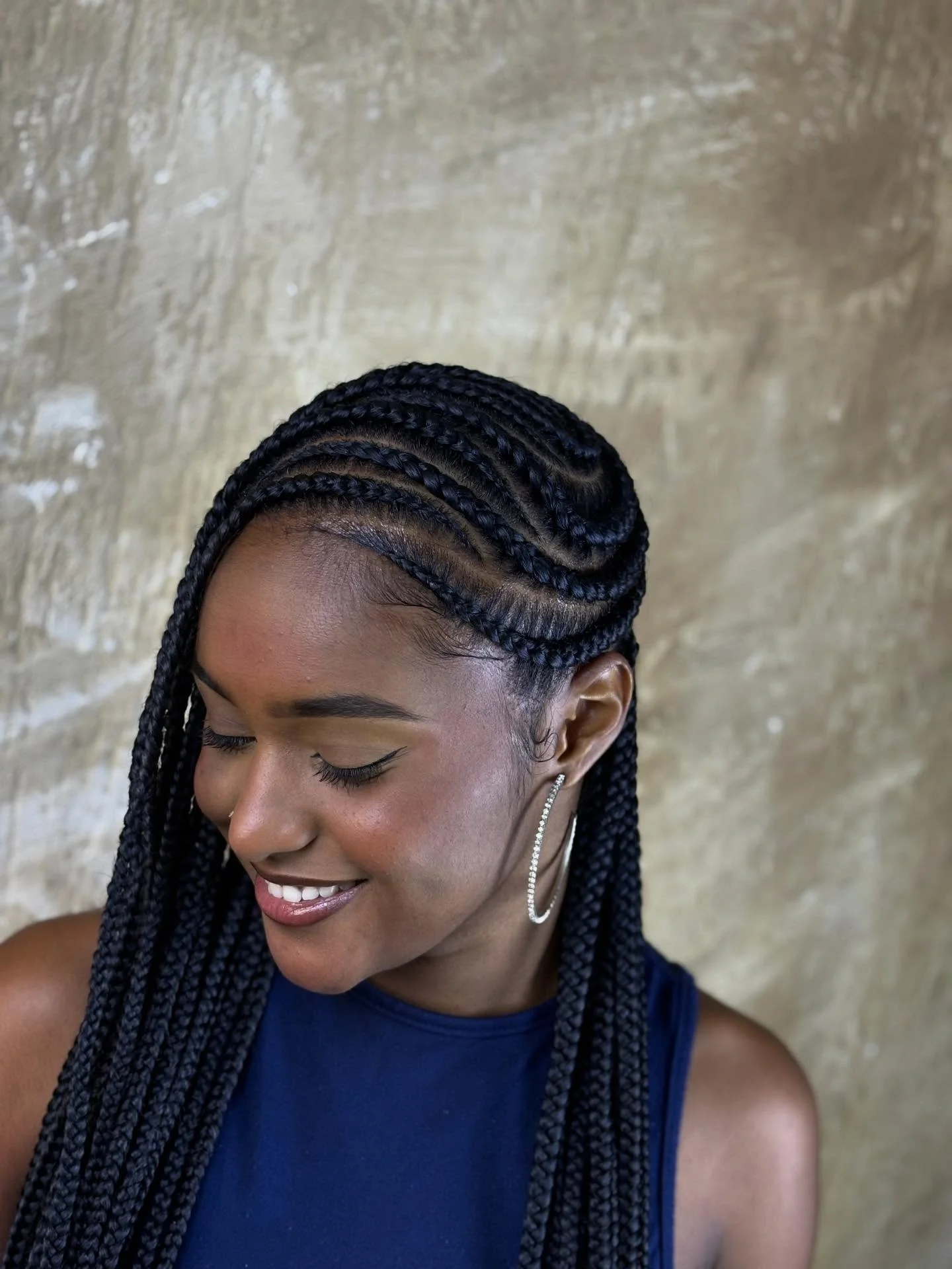lemonade braid hairstyle Soft Curved Lemonade Braids With A Minimalist Side Part