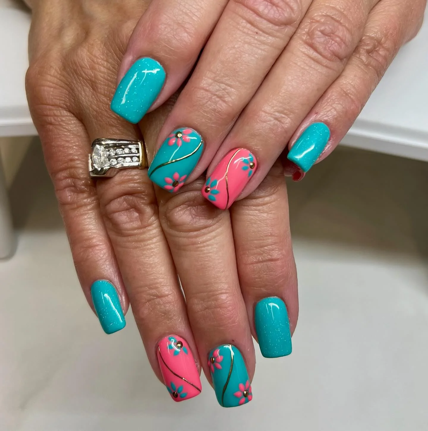 nail designs for august 2026 Turquoise And Pink Square Nails With Floral Details