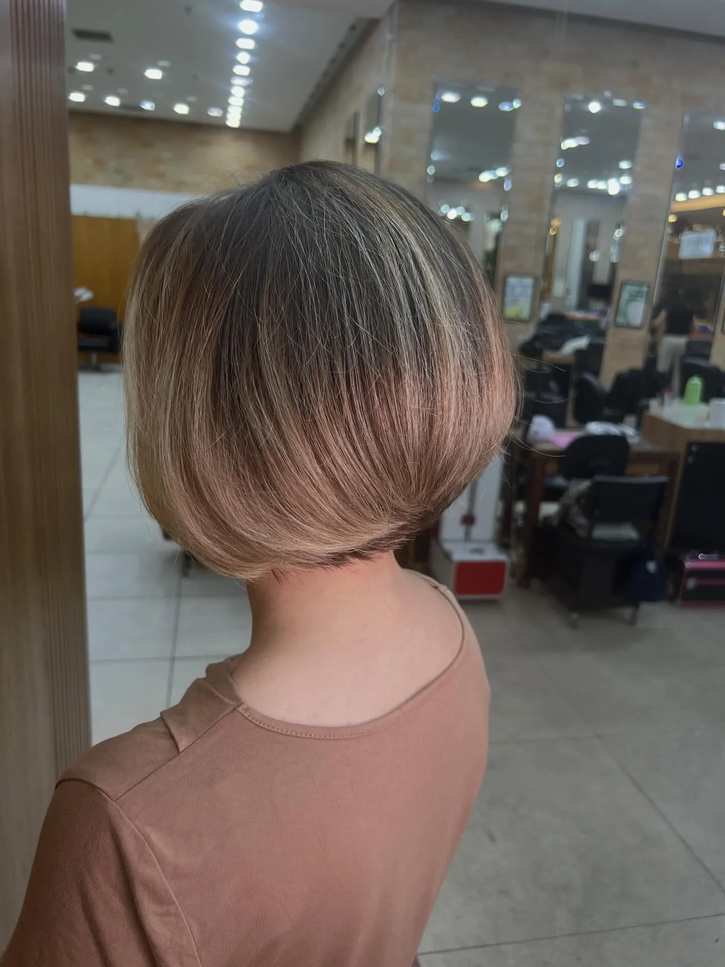 short bobbed hairstyle Dimensional Blonde Bob With Natural Volume