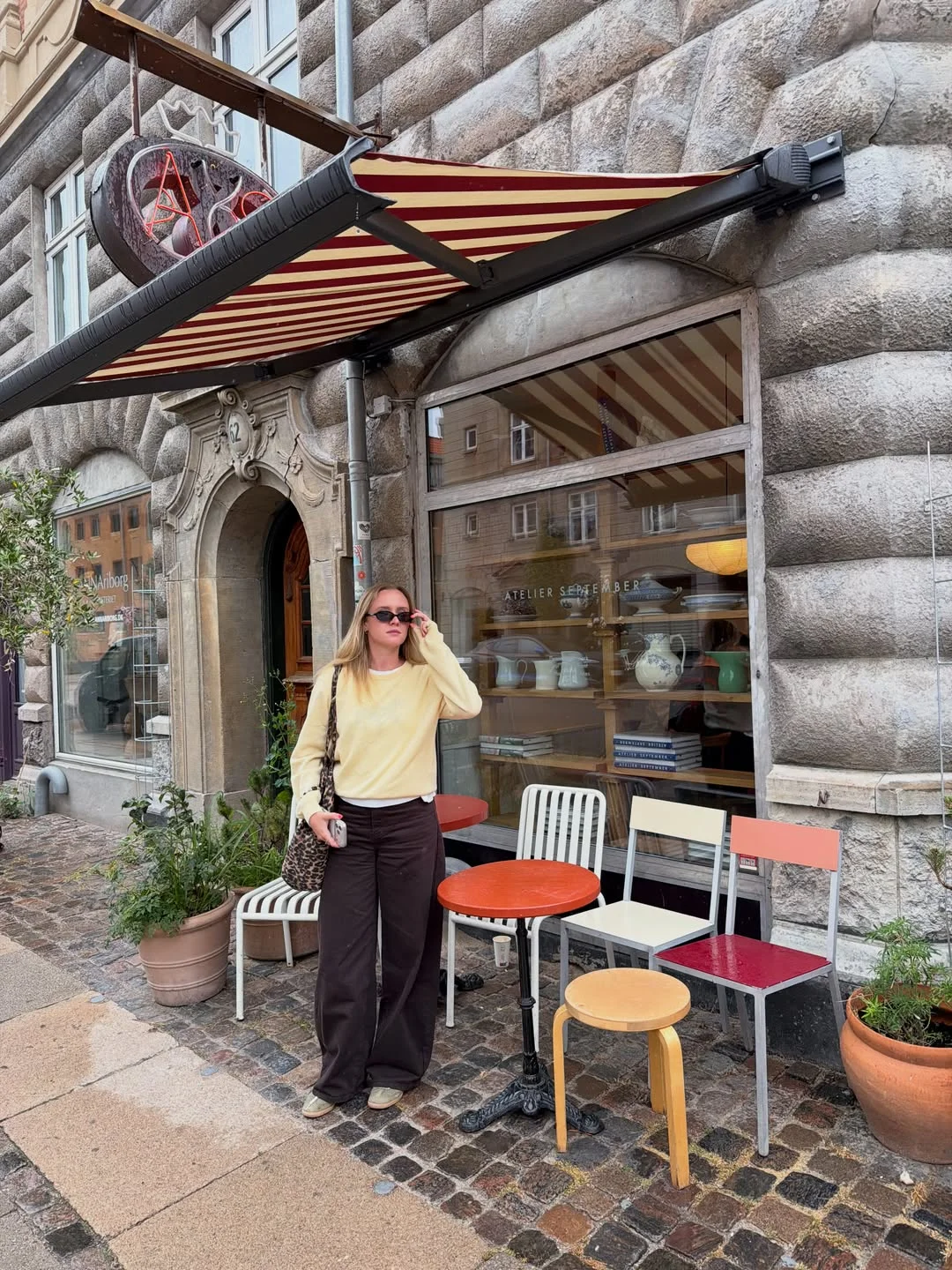 comfy fall outfits for lazy days 2026 Minimal Cream Sweater With Relaxed Brown Trousers