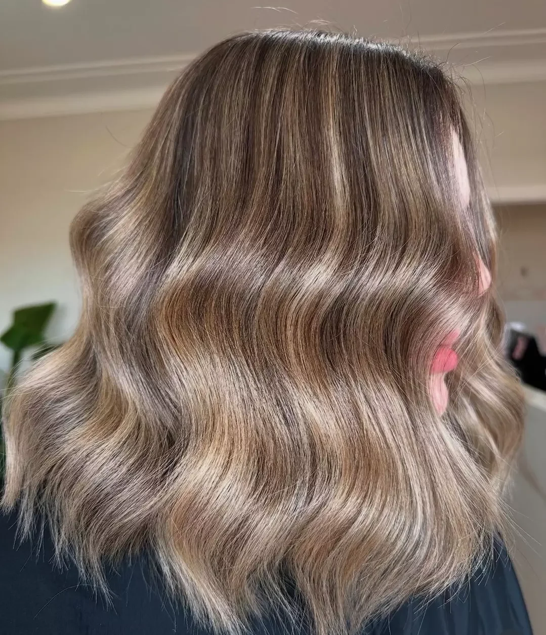 dirty blonde hair color Modern Textured Lob With Dimensional Lowlights