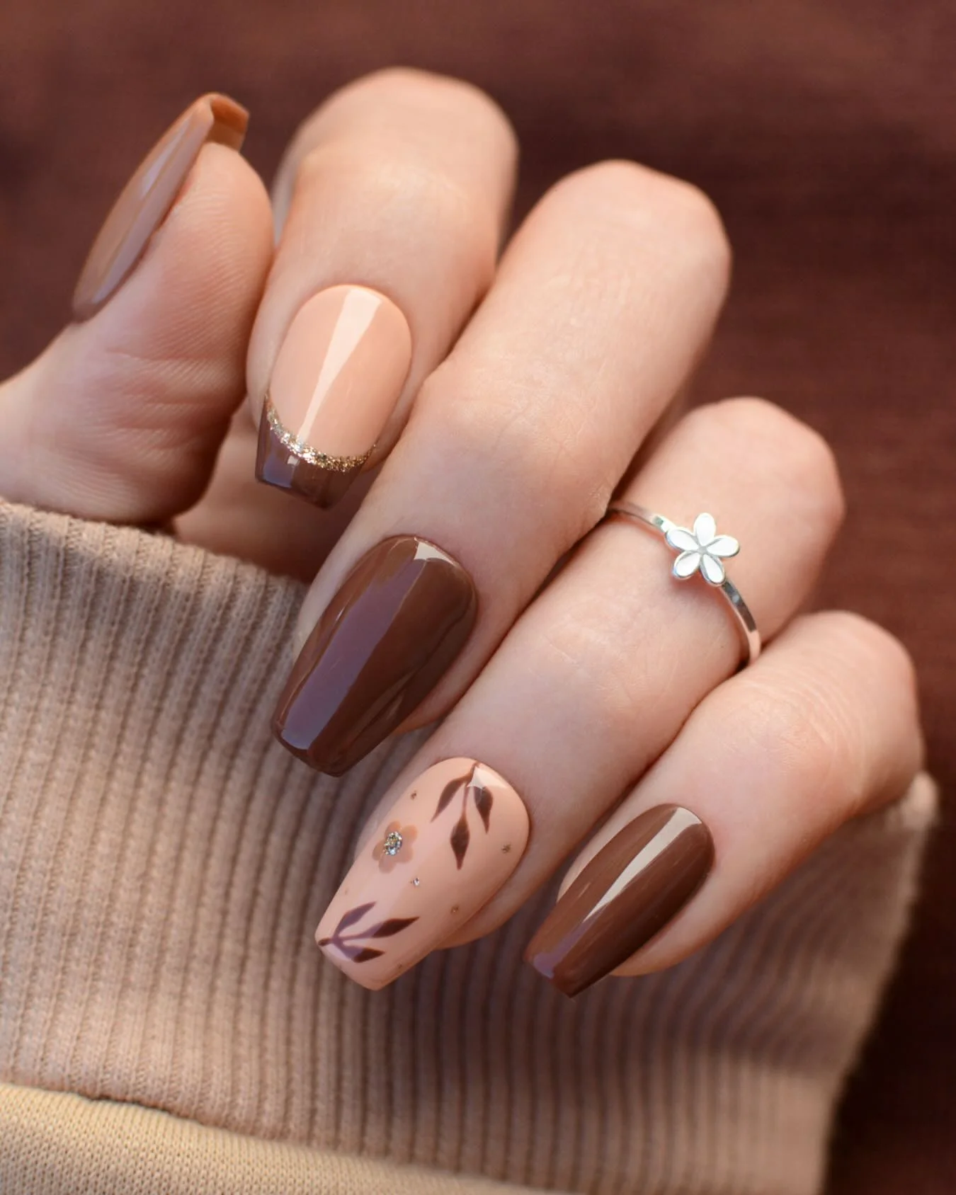 fall manicure 2026 Chocolate French Tips With Delicate Botanical Details