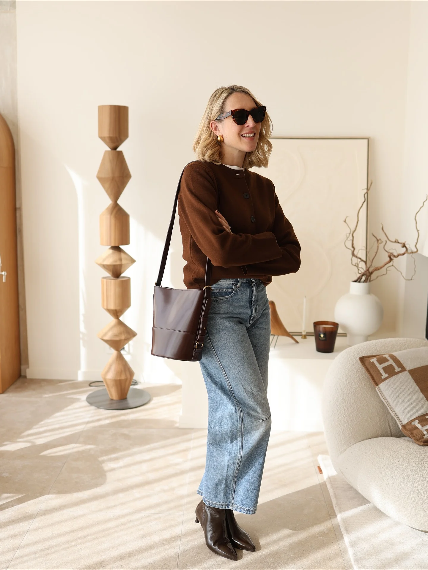 fall outfits with ankle boots 2026 Rich Chocolate Knit With Relaxed Denim And Sleek Boots