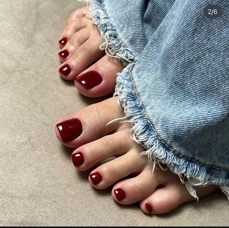 fall toe nails colors 2026 Glossy Burgundy Pedicure For A Classic Autumn Mood