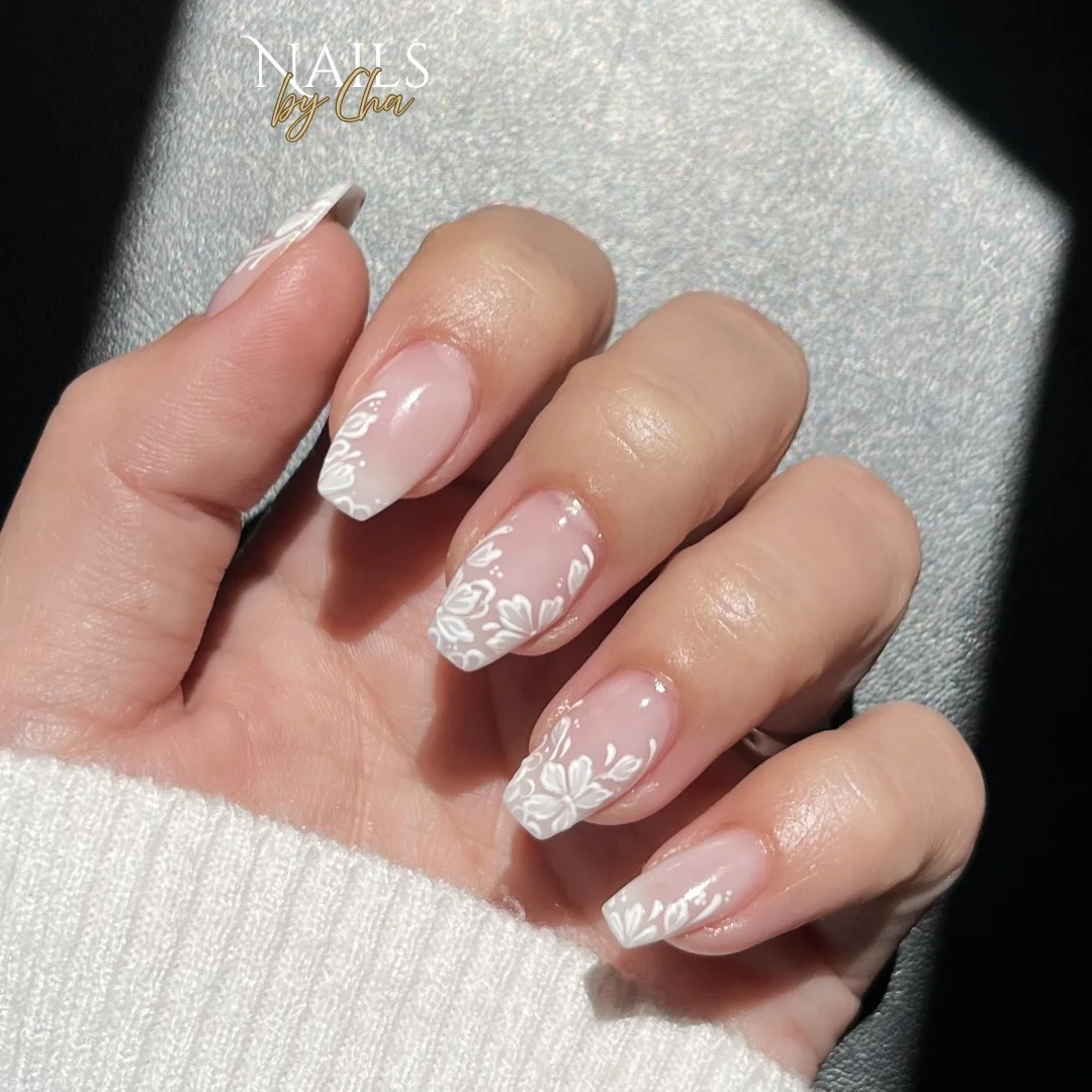 fall wedding nails 2026 Romantic White Floral French Tips For An Elegant Bride