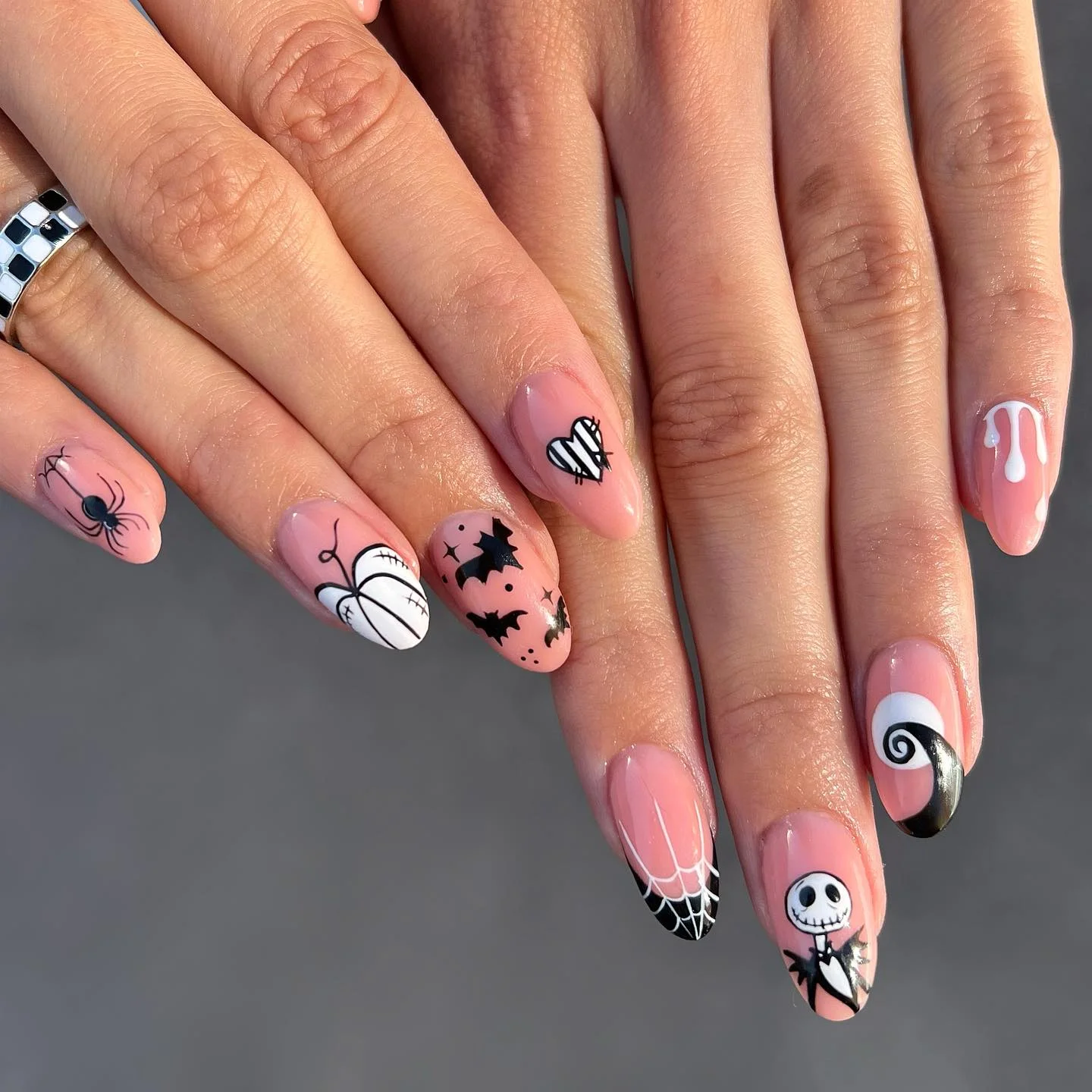 halloween nail art 2026 Pink Halloween Nails With Playful Spiders And Bats