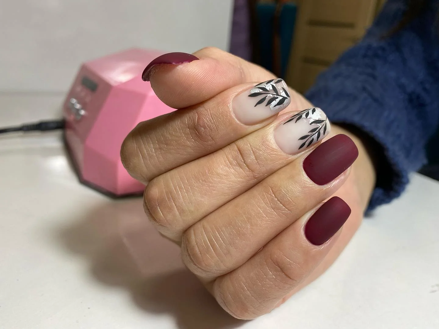 maroon fall nails 2026 Short Square Maroon Nails With Black Leaf Accents