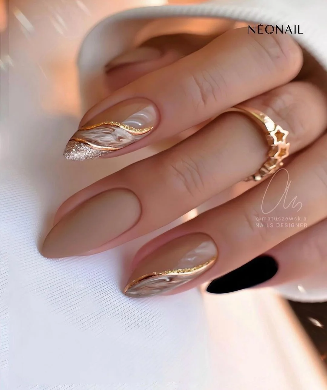 nude fall nails 2026 Sculpted Nude Almond With Liquid Metallic Waves