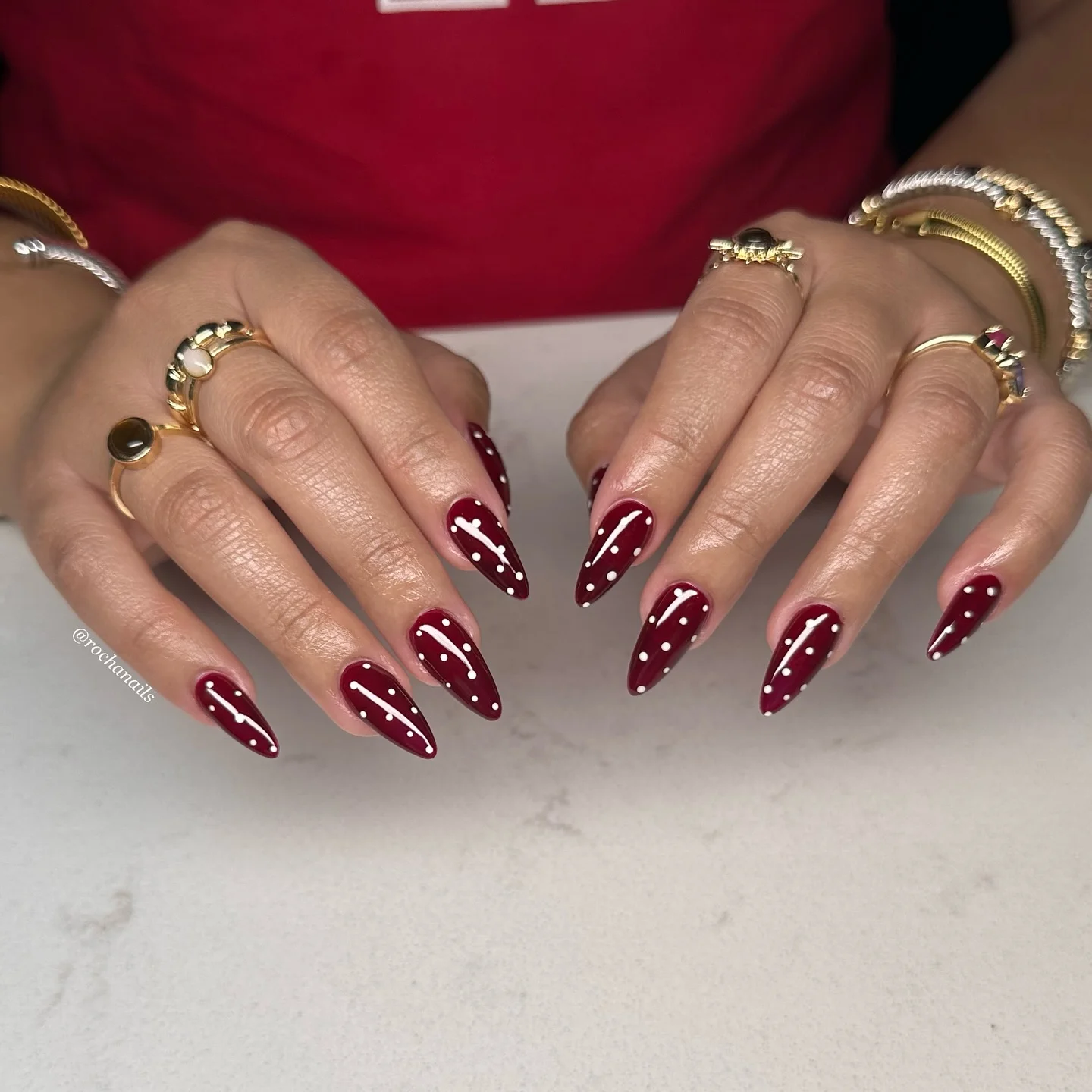 polka dot fall nails 2026 Deep Burgundy Almond Nails With White Dot Accents
