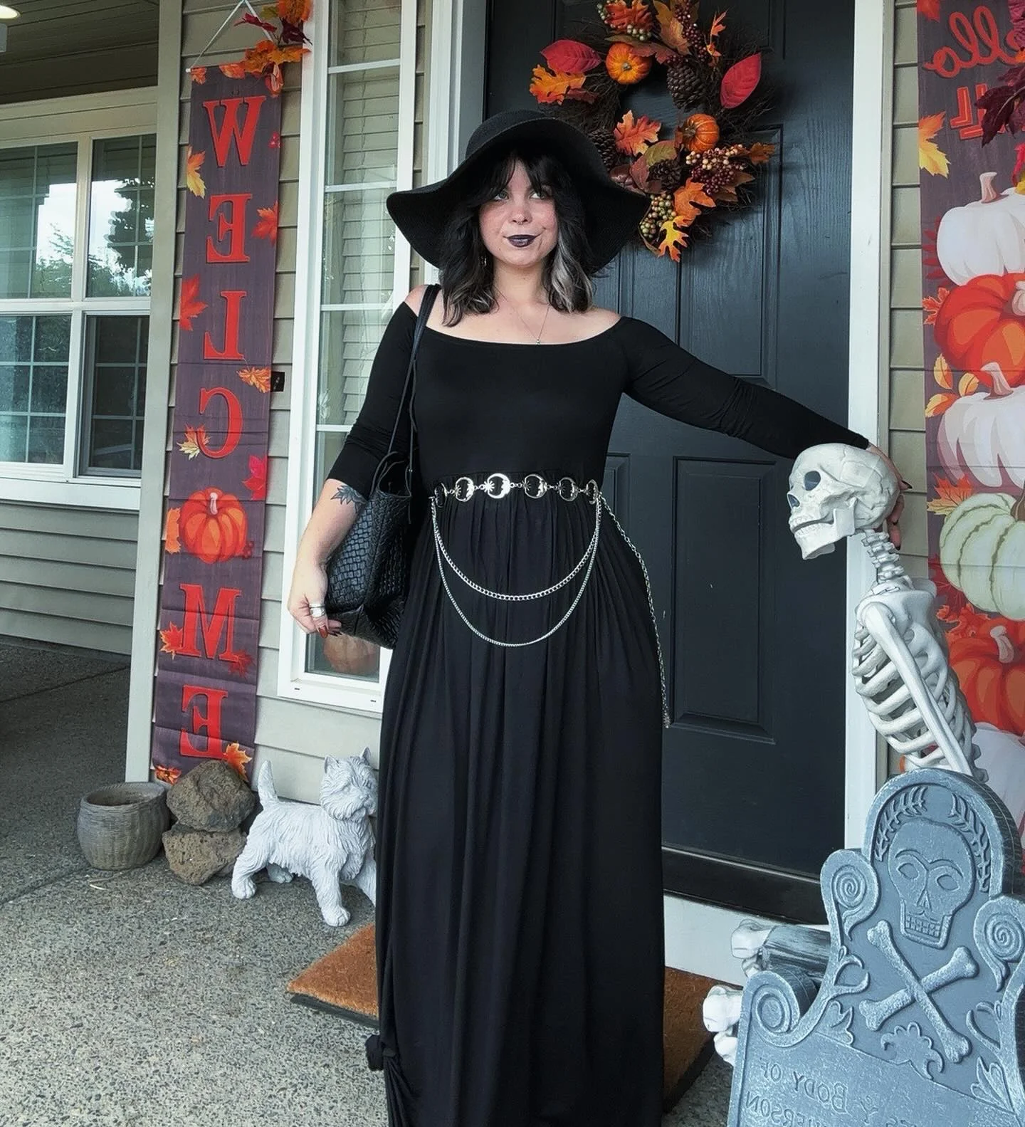 trendy halloween outfits 2026 Elegant Witch In A Long Black Dress