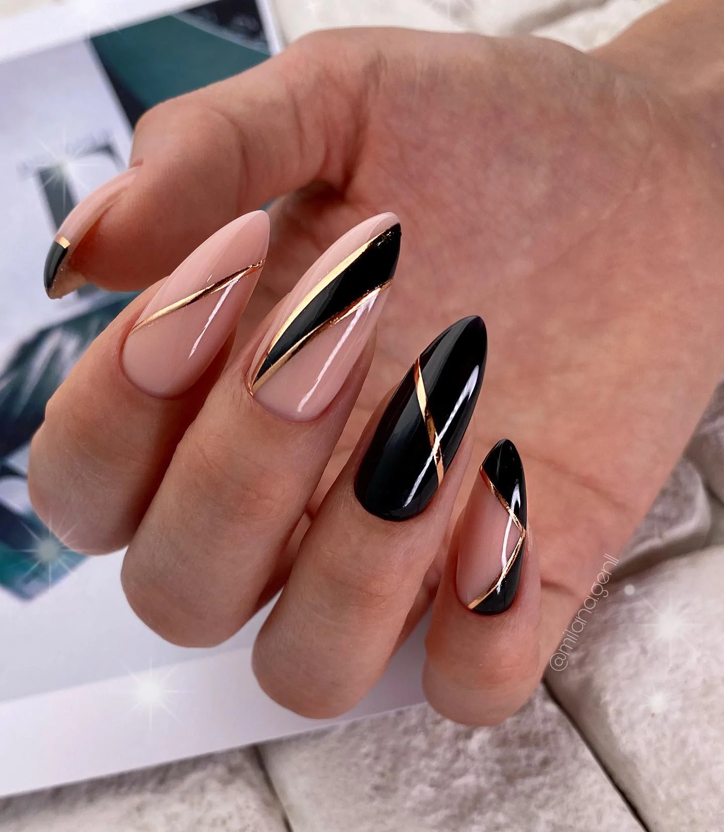 fall nails for fair skin tones 2026 Glossy Black And Nude With Fine Gold Lines
