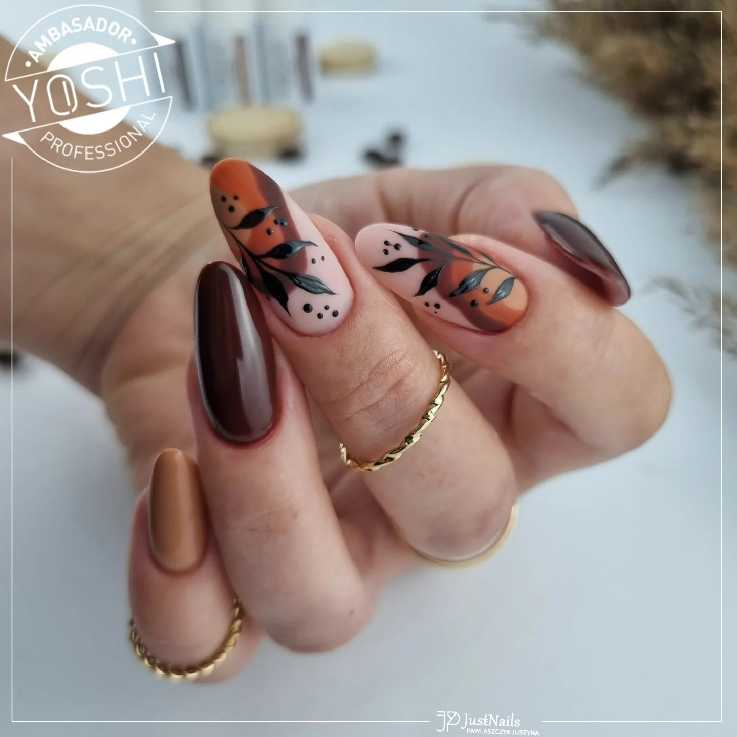 fall nails for pale skin 2026 Chocolate And Terracotta Botanical Almond Nails