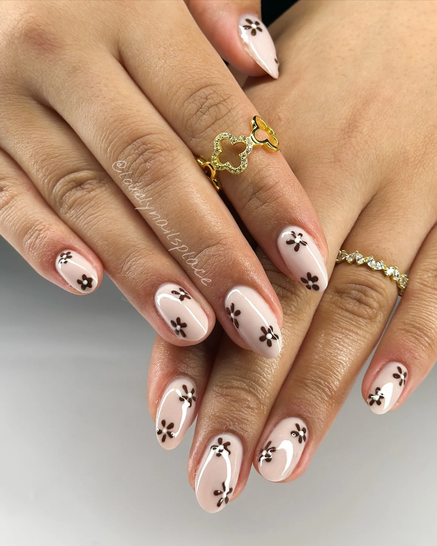 fall trendy nails 2026 Soft Pink Floral Nails With Chocolate Details