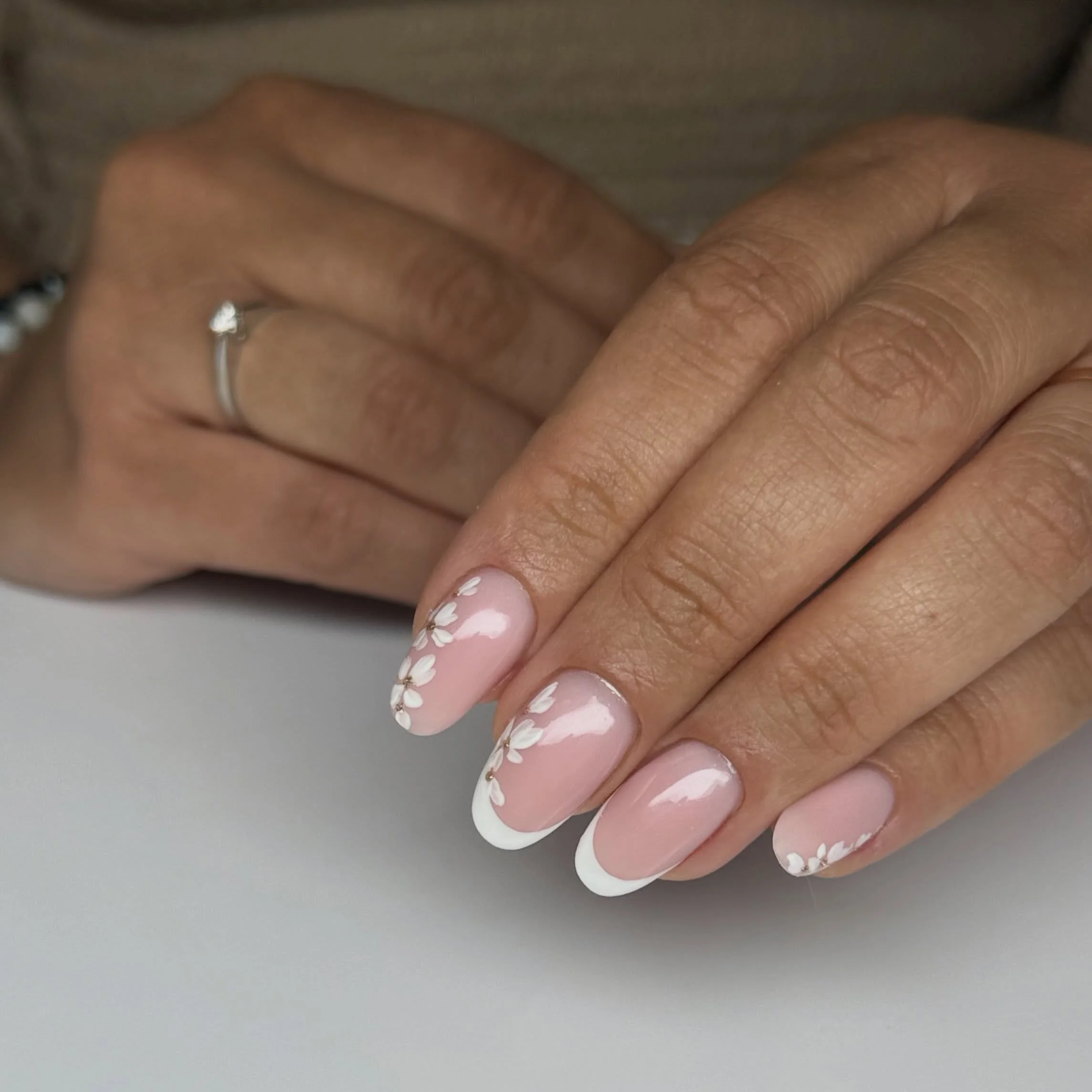 fall wedding nails 2026 Classic French Tips With Delicate Daisy Accents