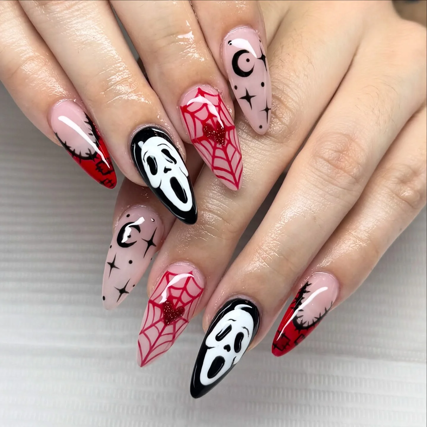 halloween nail art 2026 Glamorous Ghosts And Crimson Spiderwebs