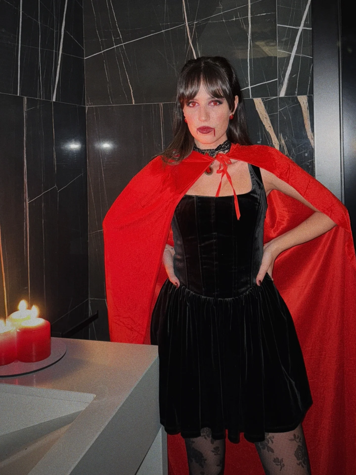 trendy halloween outfits 2026 Red Cape Vampire With A Velvet Mini Dress