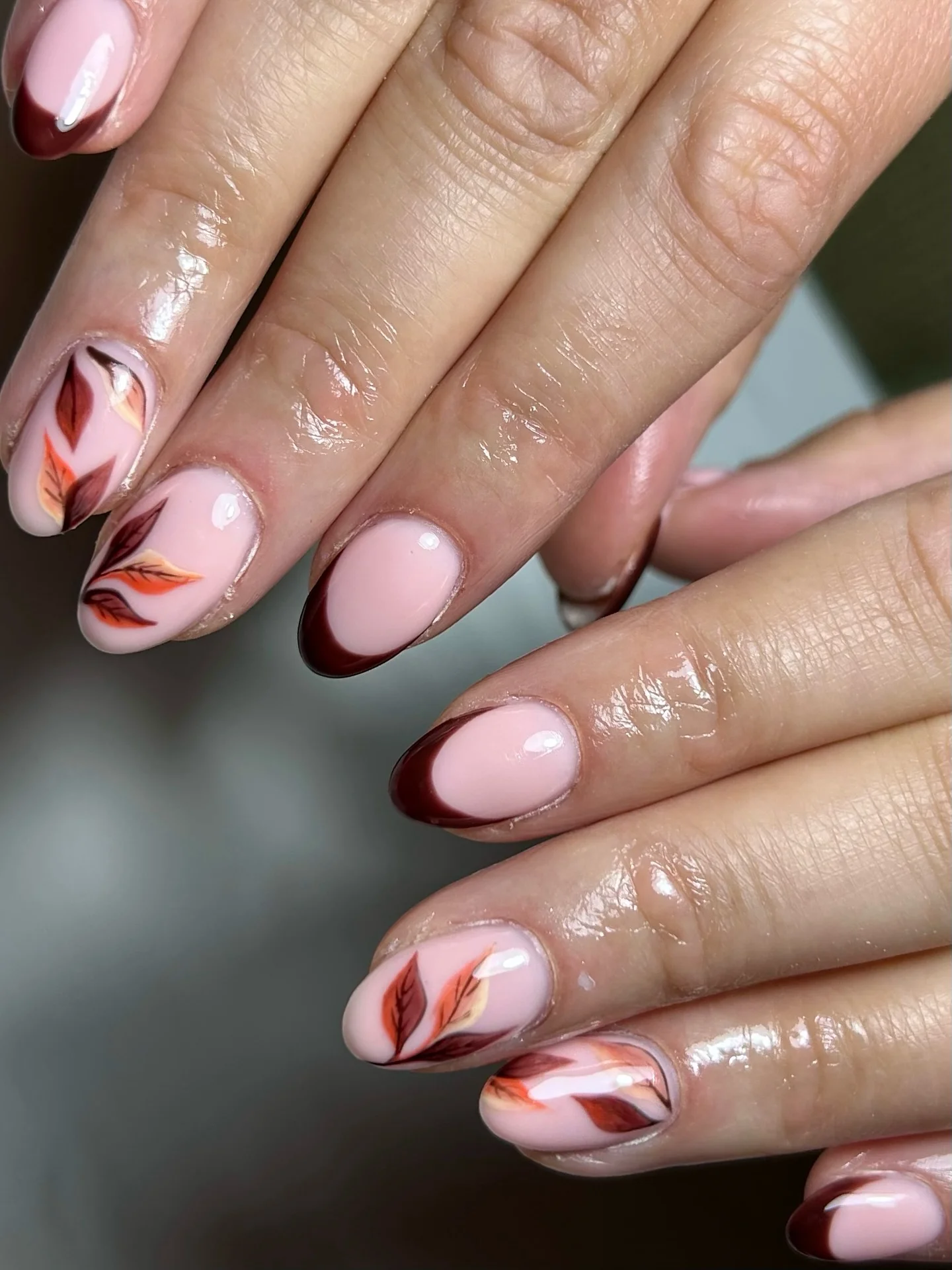 fall nail art ideas 2026 Blush Nails With Burgundy French Tips And Autumn Leaves