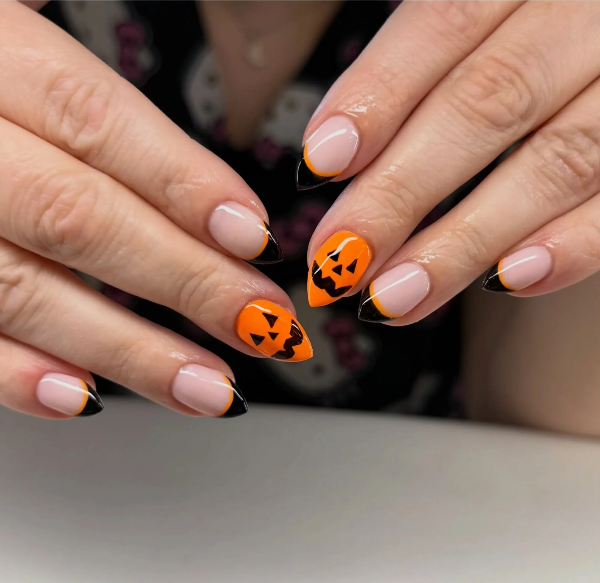 halloween nails designs 2026 Orange Jack O Lanterns With Sharp Black French Tips