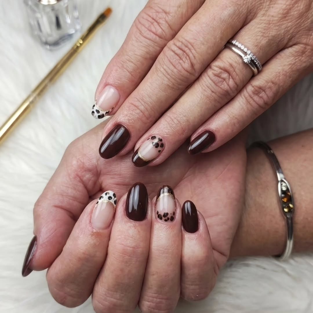 dark fall nails 2026 Chocolate French Tips With Delicate Leopard Accents