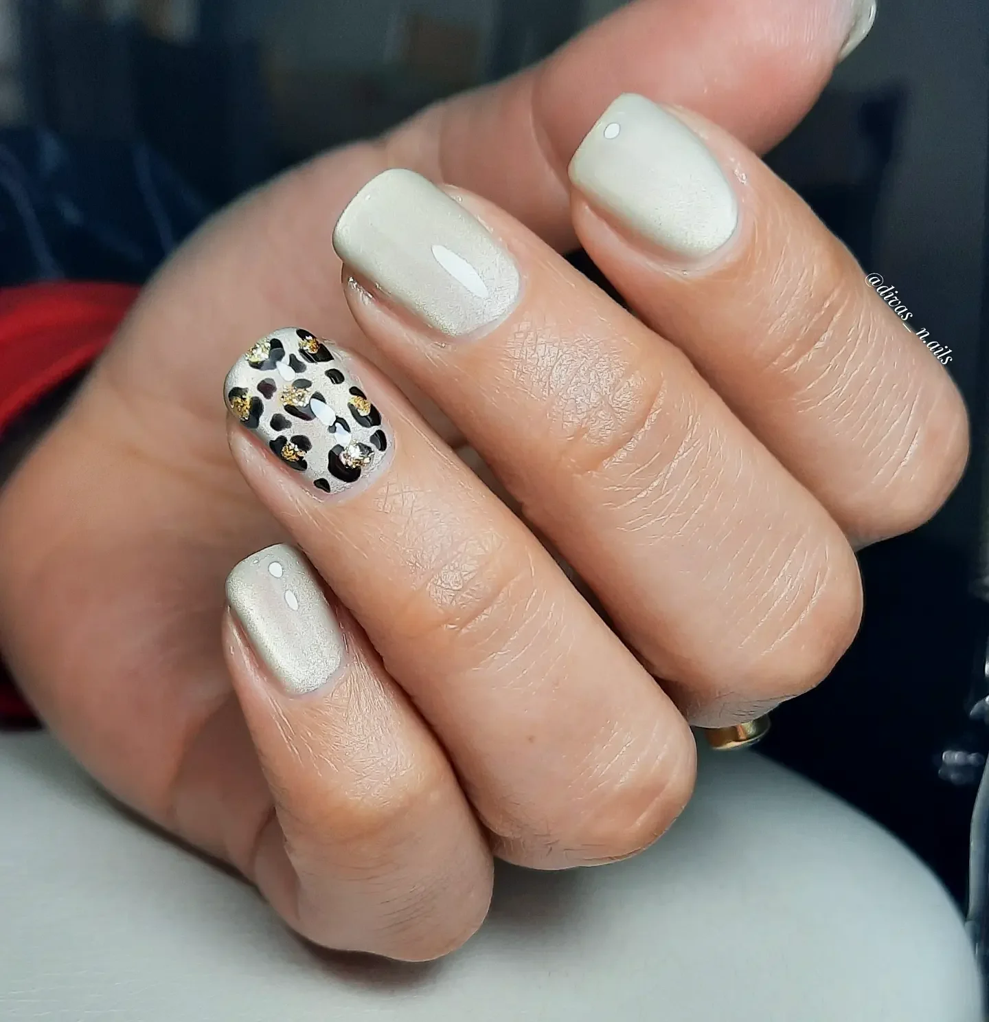 fall accent nail designs 2026 Soft Ivory With A Chic Leopard And Gold Accent
