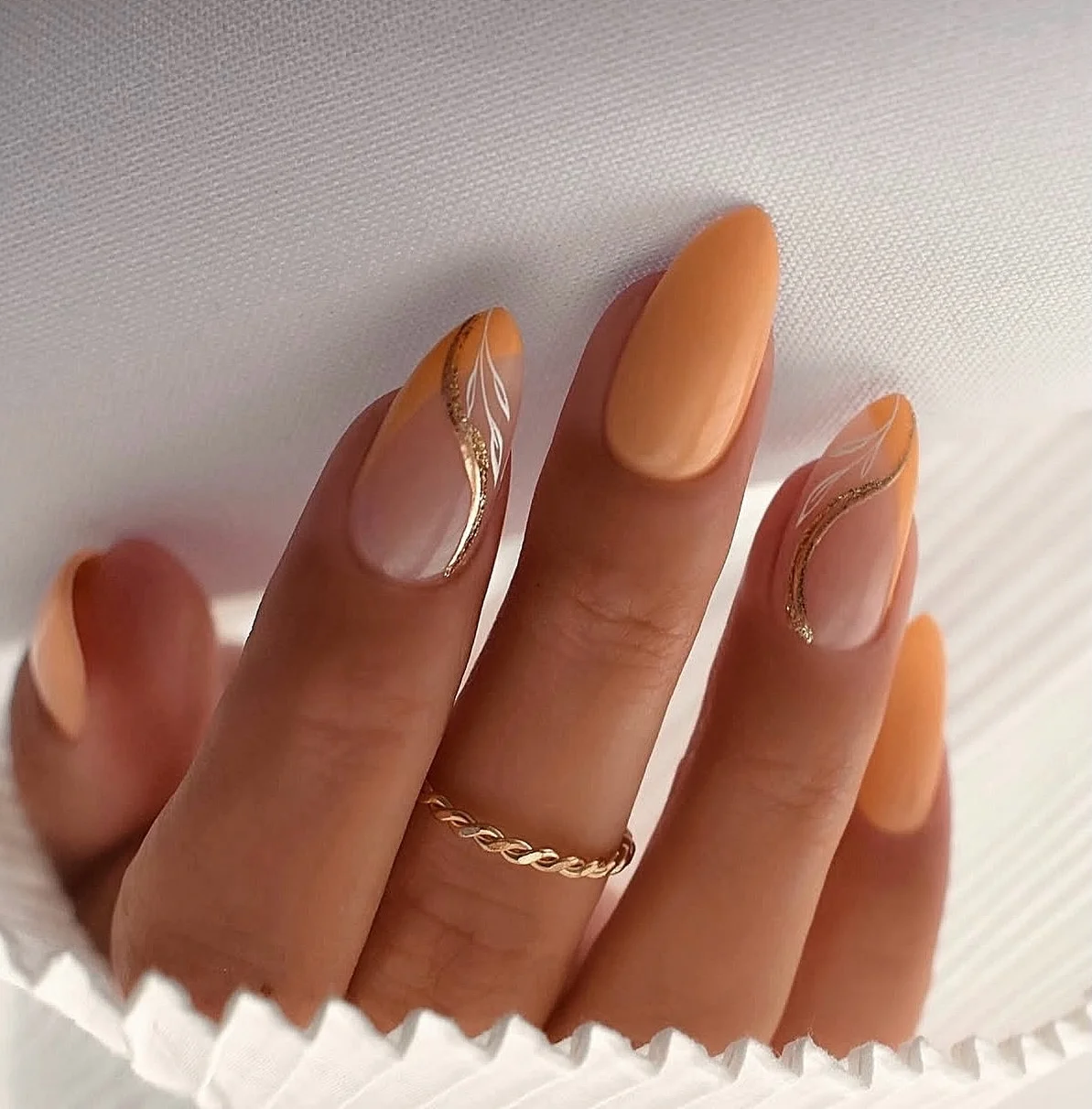 fall nails for medium skin tone Peachy Nude With Fine Gold Botanical Curves